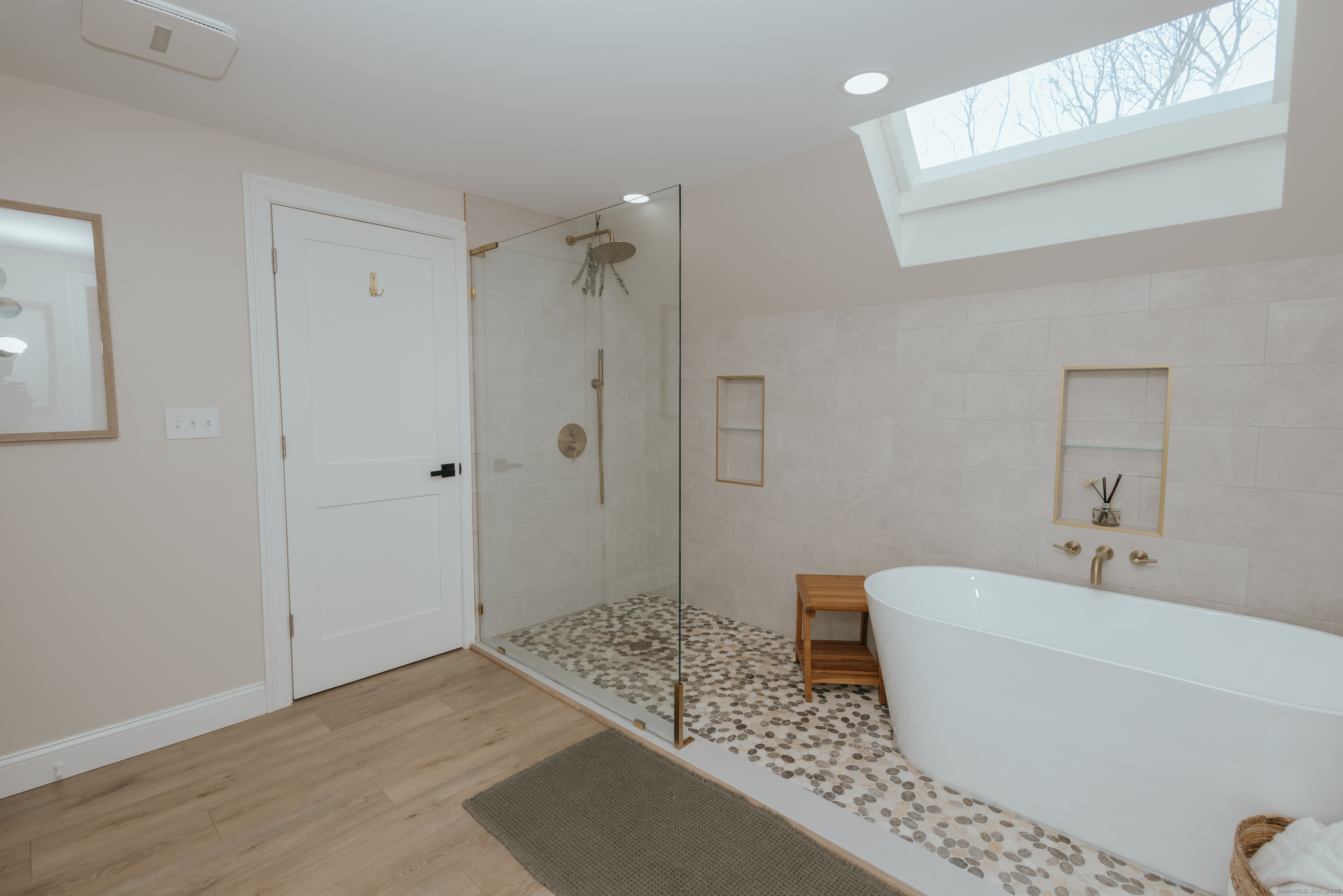 4 Moss Lane Wolcott, CT 06716 - Photo 33 of 40 a bathroom with a bathtub and shower