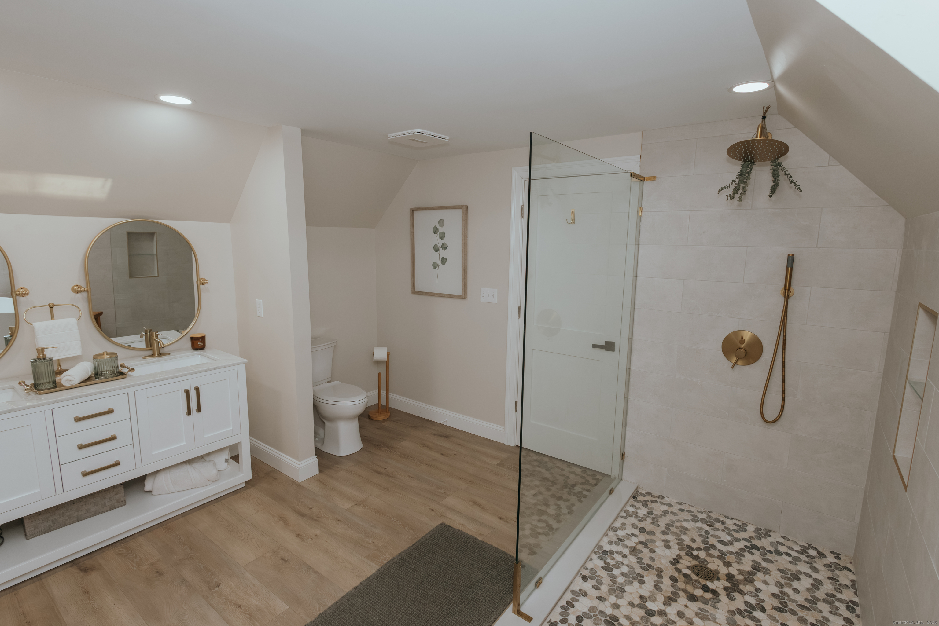 4 Moss Lane Wolcott, CT 06716 - Photo 34 of 40 a bathroom with a sink a toilet and shower