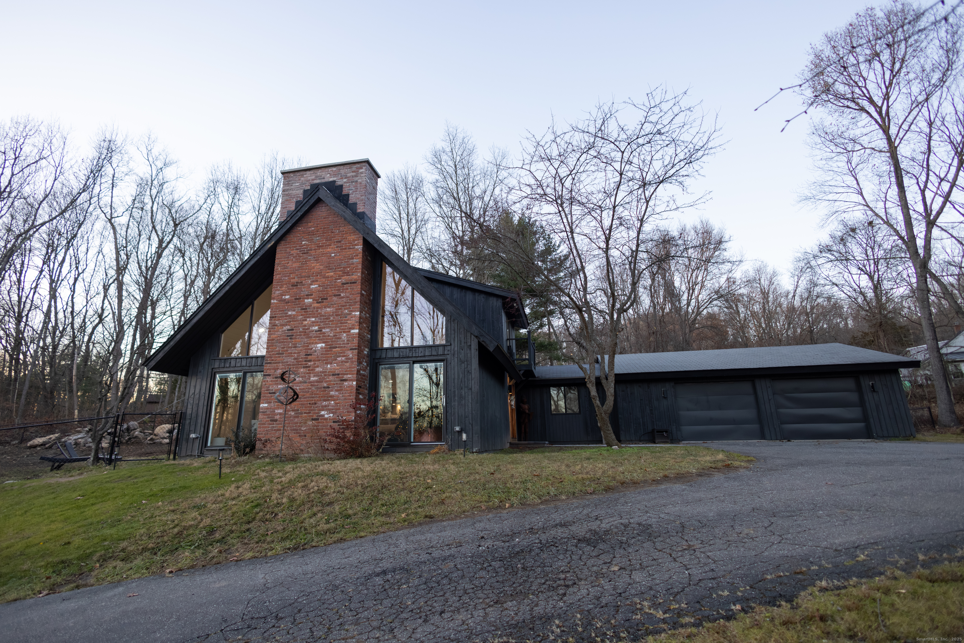 4 Moss Lane Wolcott, CT 06716 - Photo 5 of 40 a front view of a house with garden