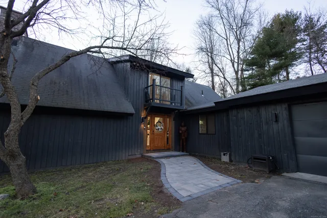 a house view with a backyard space