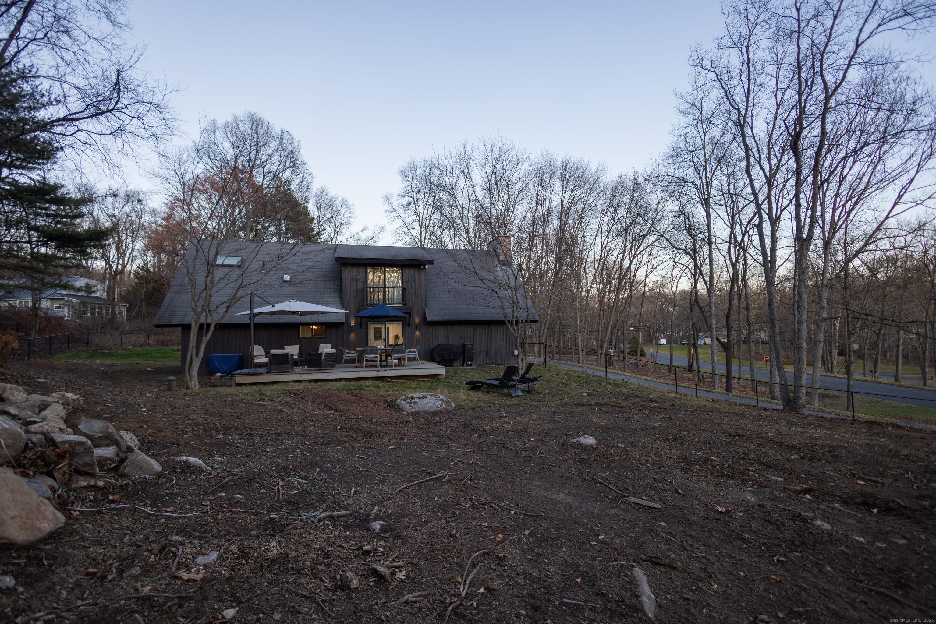 4 Moss Lane Wolcott, CT 06716 - Photo 8 of 40 a view of a house with a yard