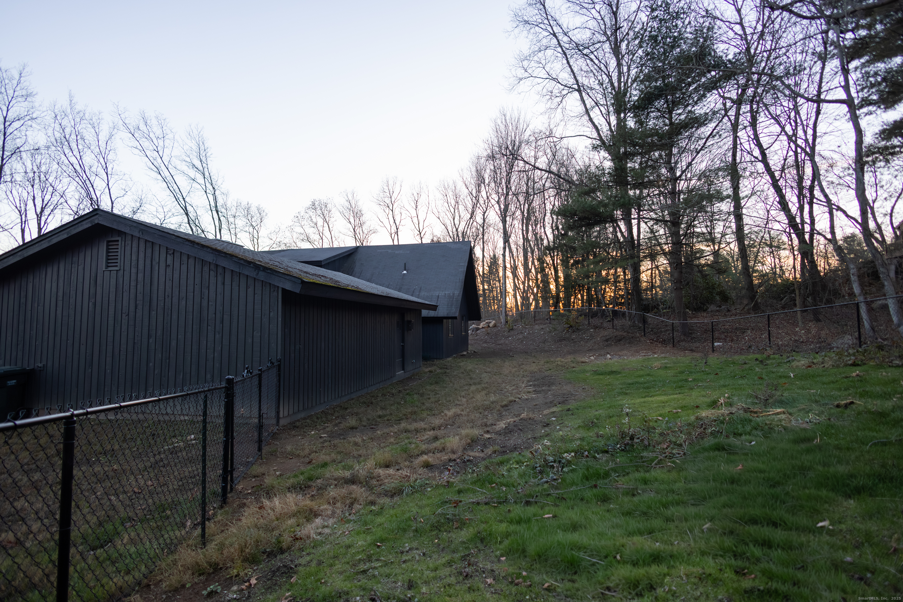 4 Moss Lane Wolcott, CT 06716 - Photo 9 of 40 a backyard of a house with lots of green space