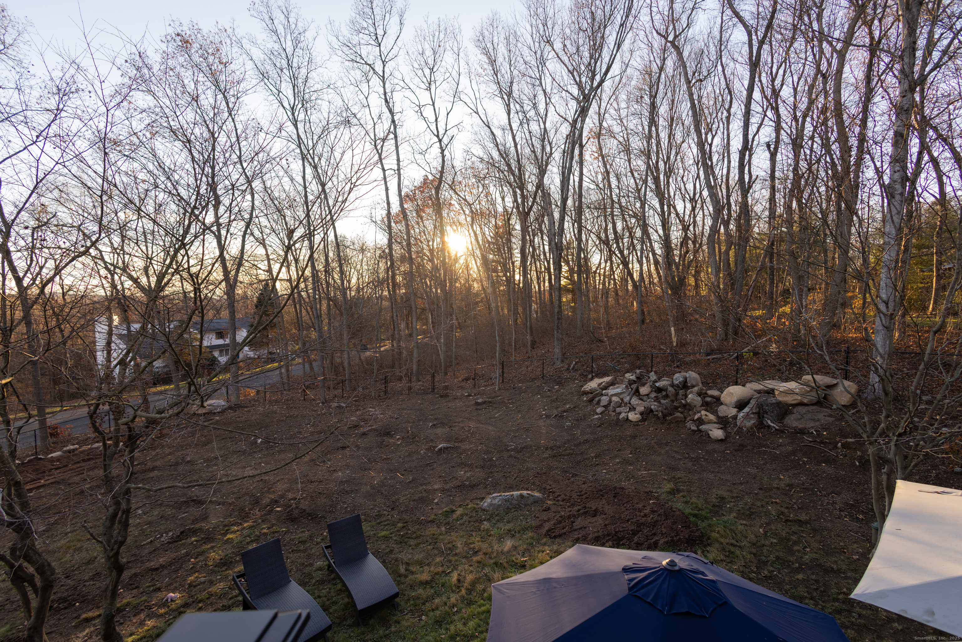 4 Moss Lane Wolcott, CT 06716 - Photo 10 of 40 a view of a backyard with large trees