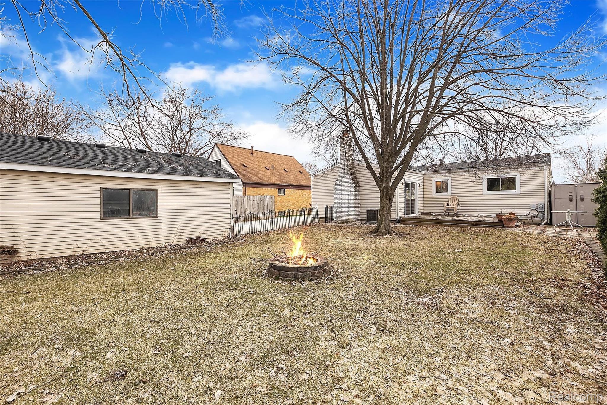 1552 Rustic Ridge Road Canton, MI 48188 - Photo 20 of 34 Nice Size Yard and Fire Pit