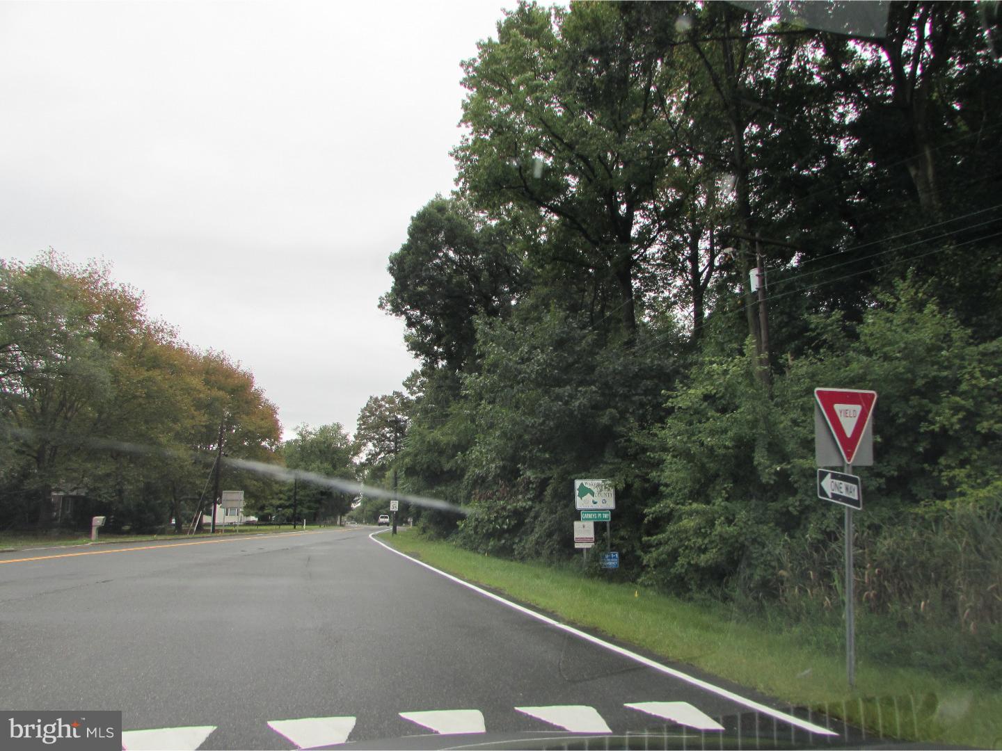 604 Hawks Bridge Road Carneys Point, NJ 08069 - Photo 2 of 5 a view of a street with a building in the background