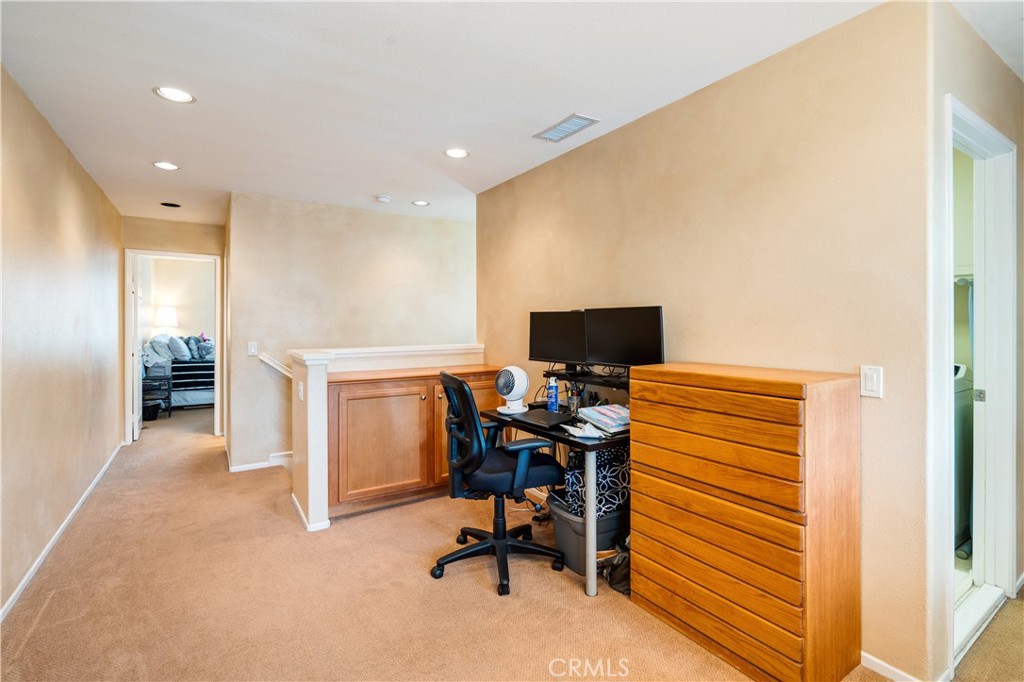 56 Freeland Irvine, CA 92602 - Photo 15 of 28 a view of a workspace with furniture and a window