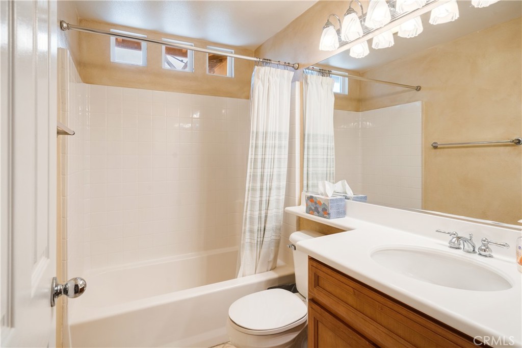 56 Freeland Irvine, CA 92602 - Photo 22 of 28 a bathroom with a sink a toilet and shower