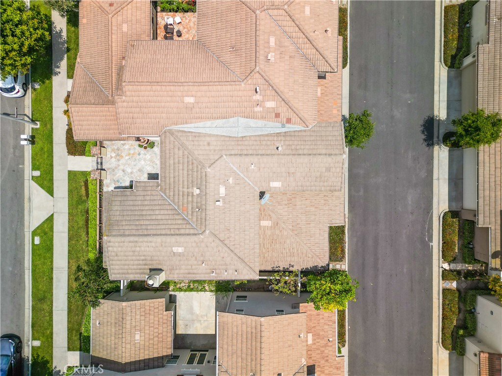 56 Freeland Irvine, CA 92602 - Photo 25 of 28 aerial view of a house with a yard and potted plants