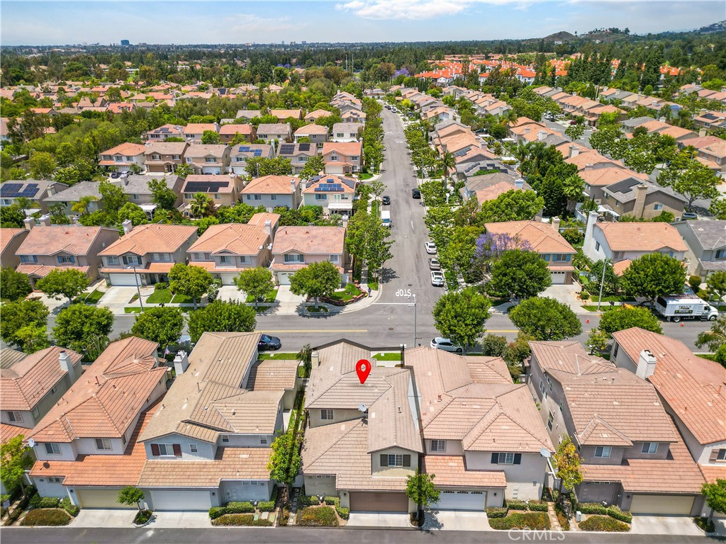 56 Freeland Irvine, CA 92602 - Photo 26 of 28 an aerial view of residential houses with outdoor space