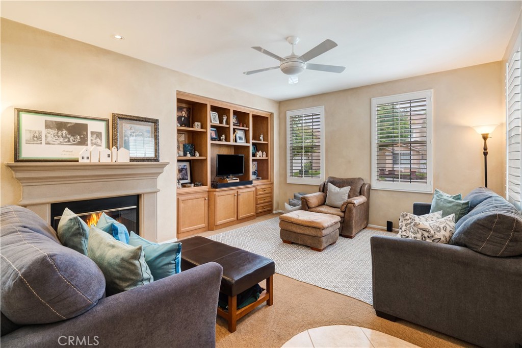 56 Freeland Irvine, CA 92602 - Photo 6 of 28 a living room with furniture and a fireplace