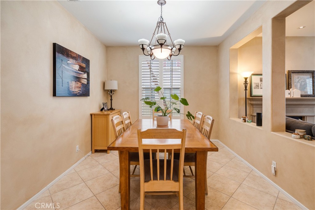 56 Freeland Irvine, CA 92602 - Photo 8 of 28 a dining room with furniture and window
