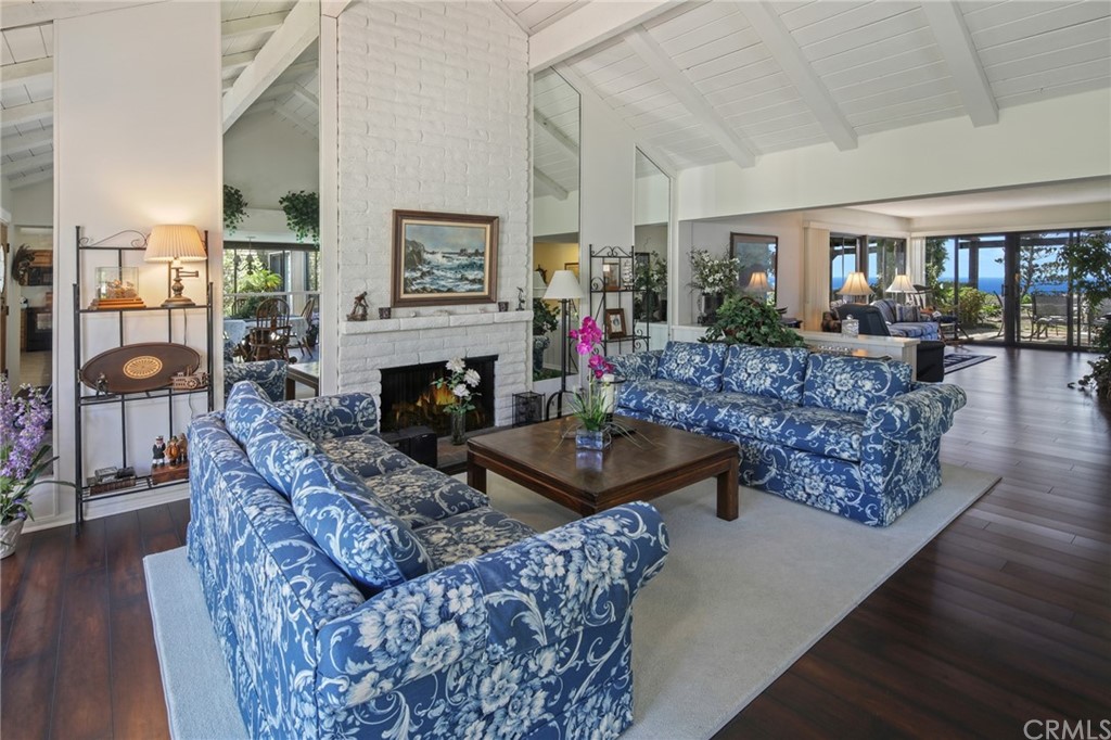 23741 Perth Bay Dana Point, CA 92629 - Photo 3 of 25 a living room with furniture and a fireplace