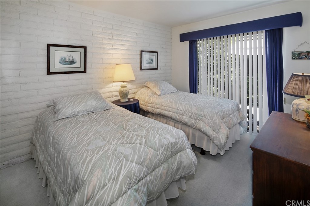 23741 Perth Bay Dana Point, CA 92629 - Photo 9 of 25 a bedroom with two beds and a window
