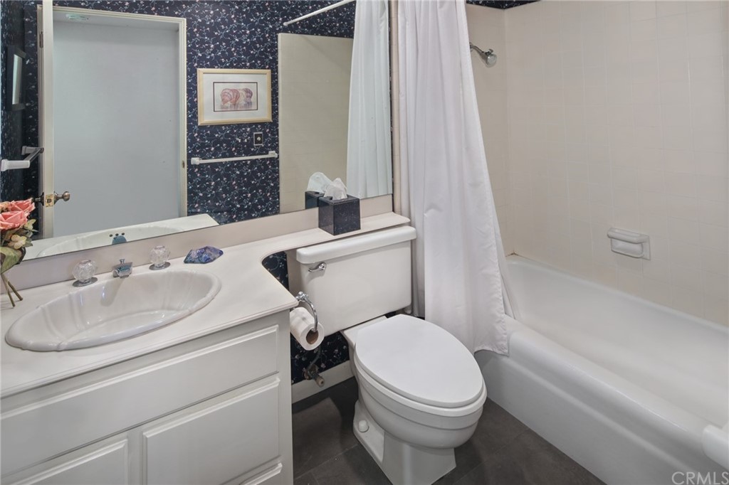 23741 Perth Bay Dana Point, CA 92629 - Photo 10 of 25 a bathroom with a sink toilet and shower