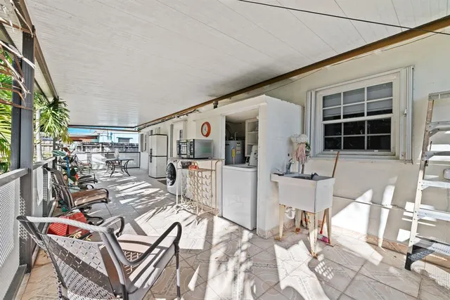 a outdoor space with lots of tables and chairs