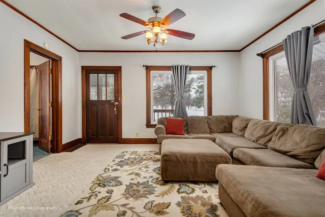 a living room with furniture and a window