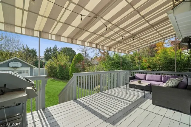 a view of a couches on the roof deck
