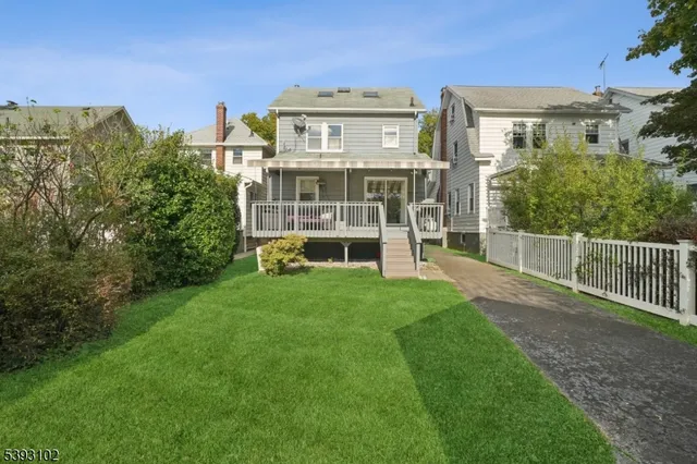 a view of a building with a yard
