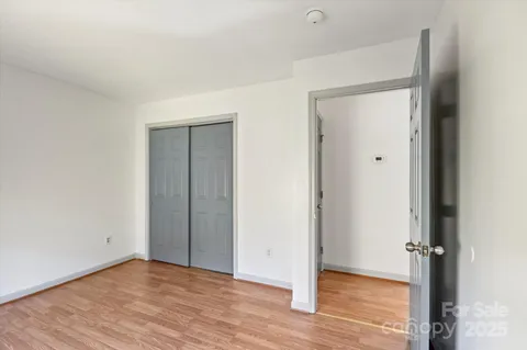 a bedroom with a workspace