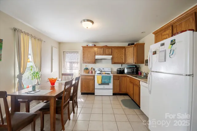 a living room with furniture and flat screen tv