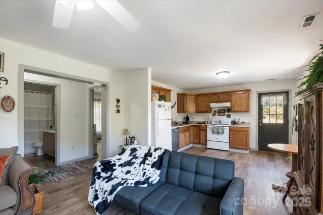 a bed room with a bed and a chair