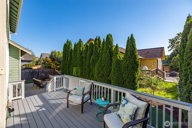 a view of a chairs on the roof deck