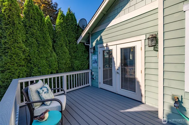 a view of deck with furniture and wooden floor
