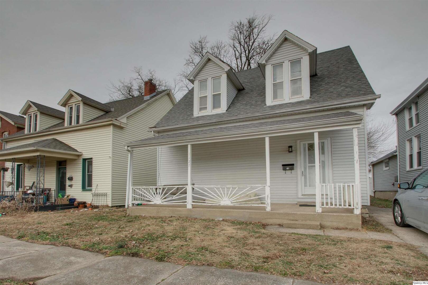1127 Payson Avenue Quincy, IL 62301 - Photo 4 of 16 front view of a house with a yard