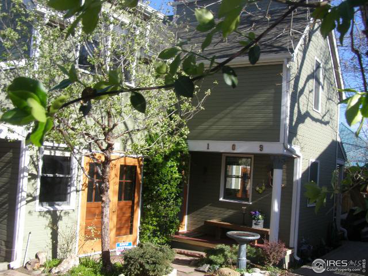 2109 Mapleton Avenue Boulder, CO 80304 - Photo 1 of 1 a front view of a house with garden