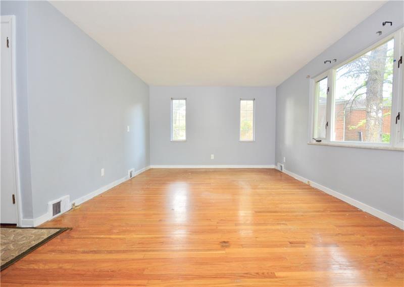 3576 Ridgewood Drive Pittsburgh, PA 15235 - Photo 11 of 25 1ST FLOOR GUEST LIVING ROOM