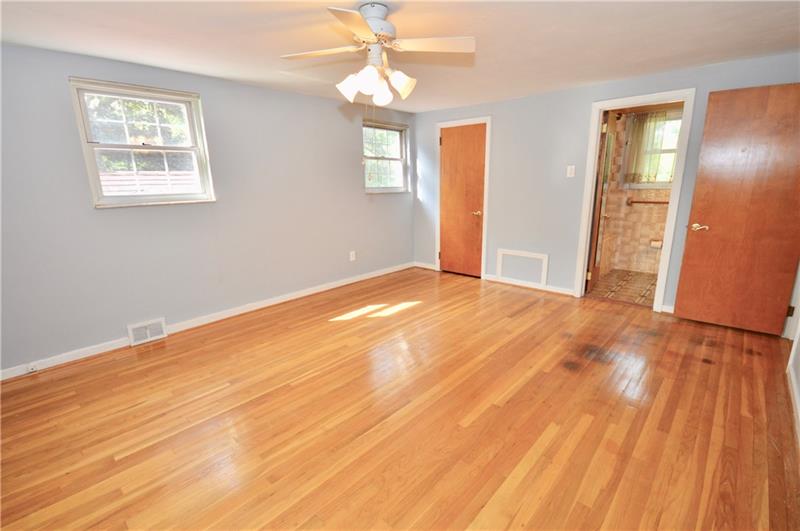 3576 Ridgewood Drive Pittsburgh, PA 15235 - Photo 15 of 25 MASTER BEDROOM LOOKING TOWARDS WALK IN CLOSET & FULL BATHROOM
