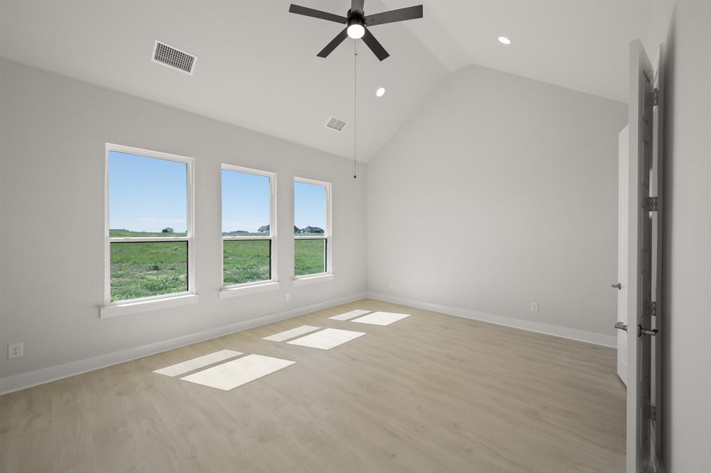 131 Adilynn Trail Venus, TX 76084 - Photo 32 of 40 21_131 Adilynn- Primary Suite-1