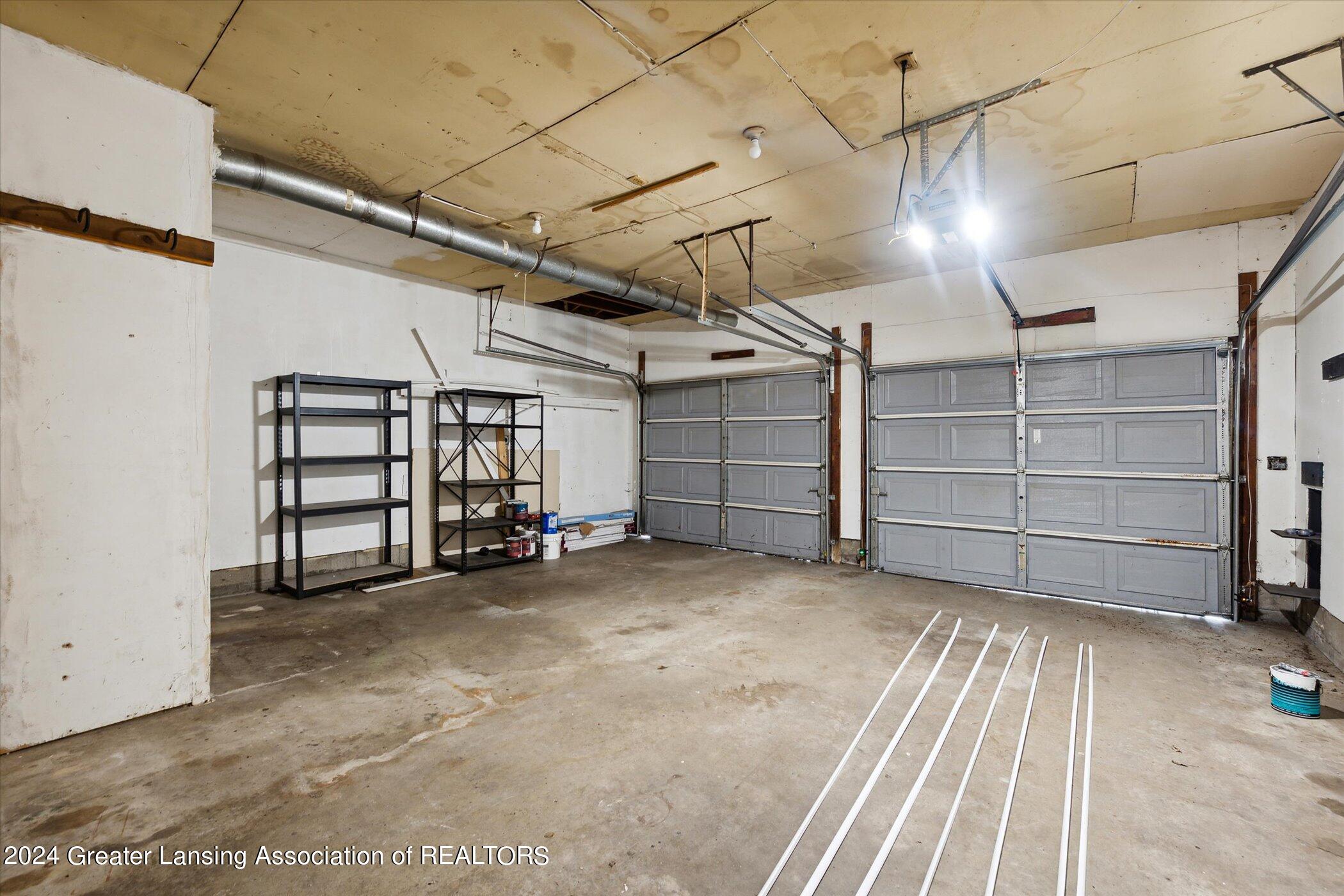 2385 Pine Tree Road Holt, MI 48842 - Photo 43 of 55 Garage Interior