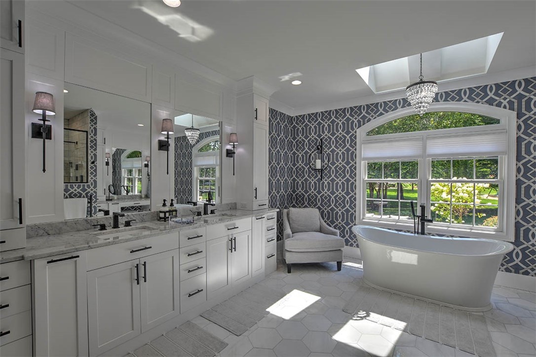 6323 Autumn Ridge Court Decatur, IL 62521 - Photo 19 of 43 a spacious bathroom with a large tub sink and mirror