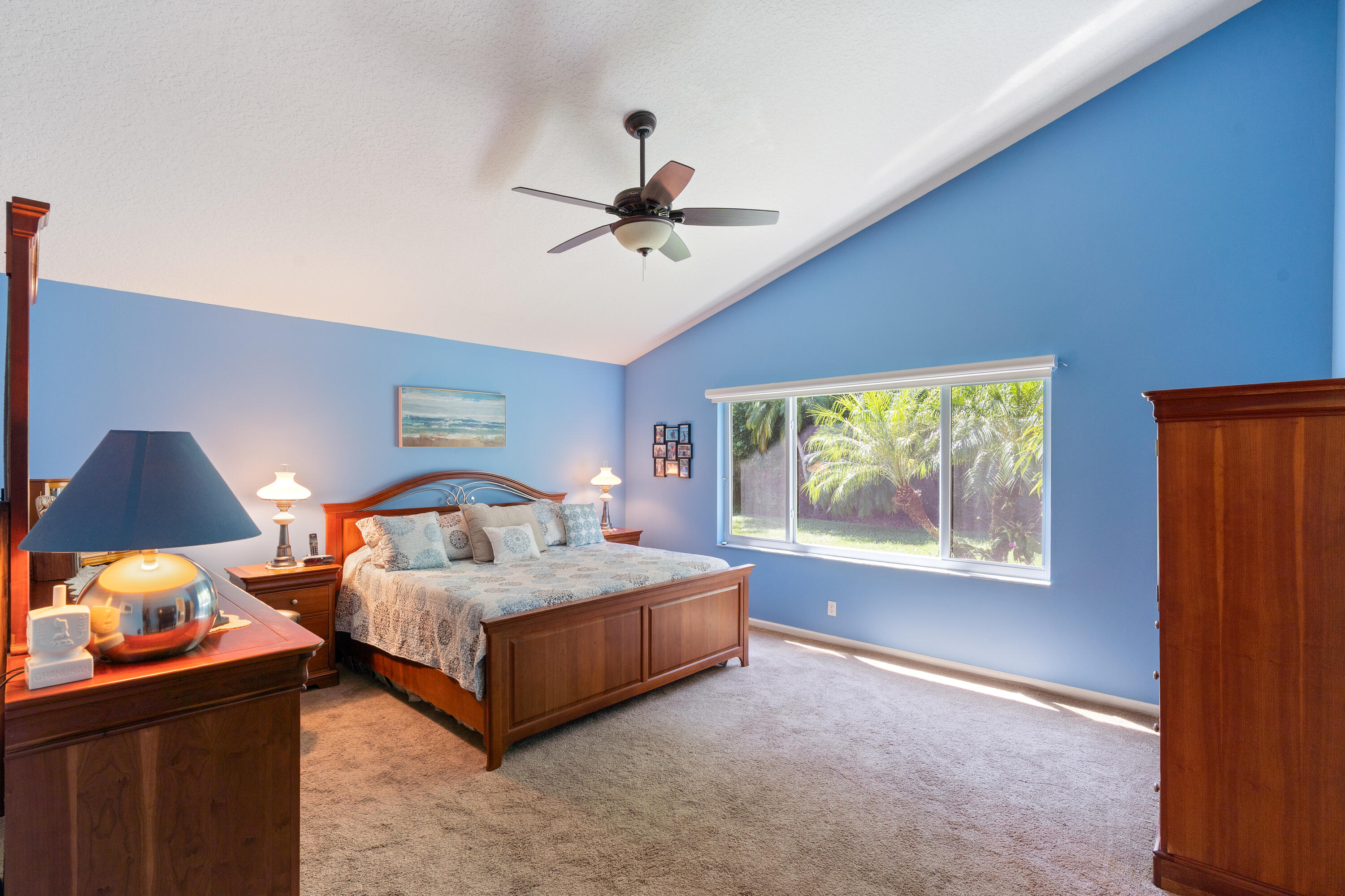 7296 Falls Road East Boynton Beach, FL 33437 - Photo 14 of 25 a bedroom with a bed and window