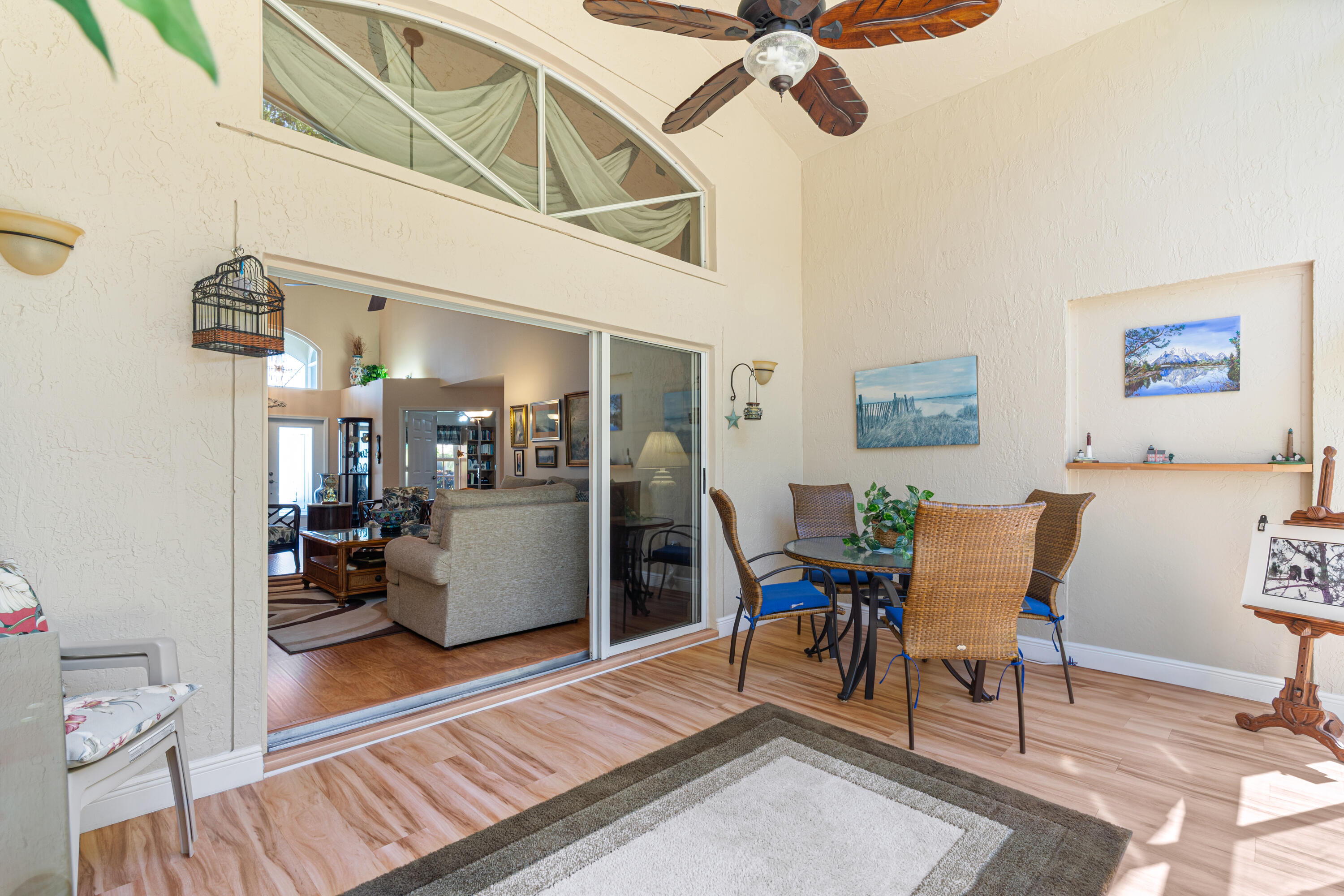 7296 Falls Road East Boynton Beach, FL 33437 - Photo 24 of 25 a living room with furniture and a wooden floor
