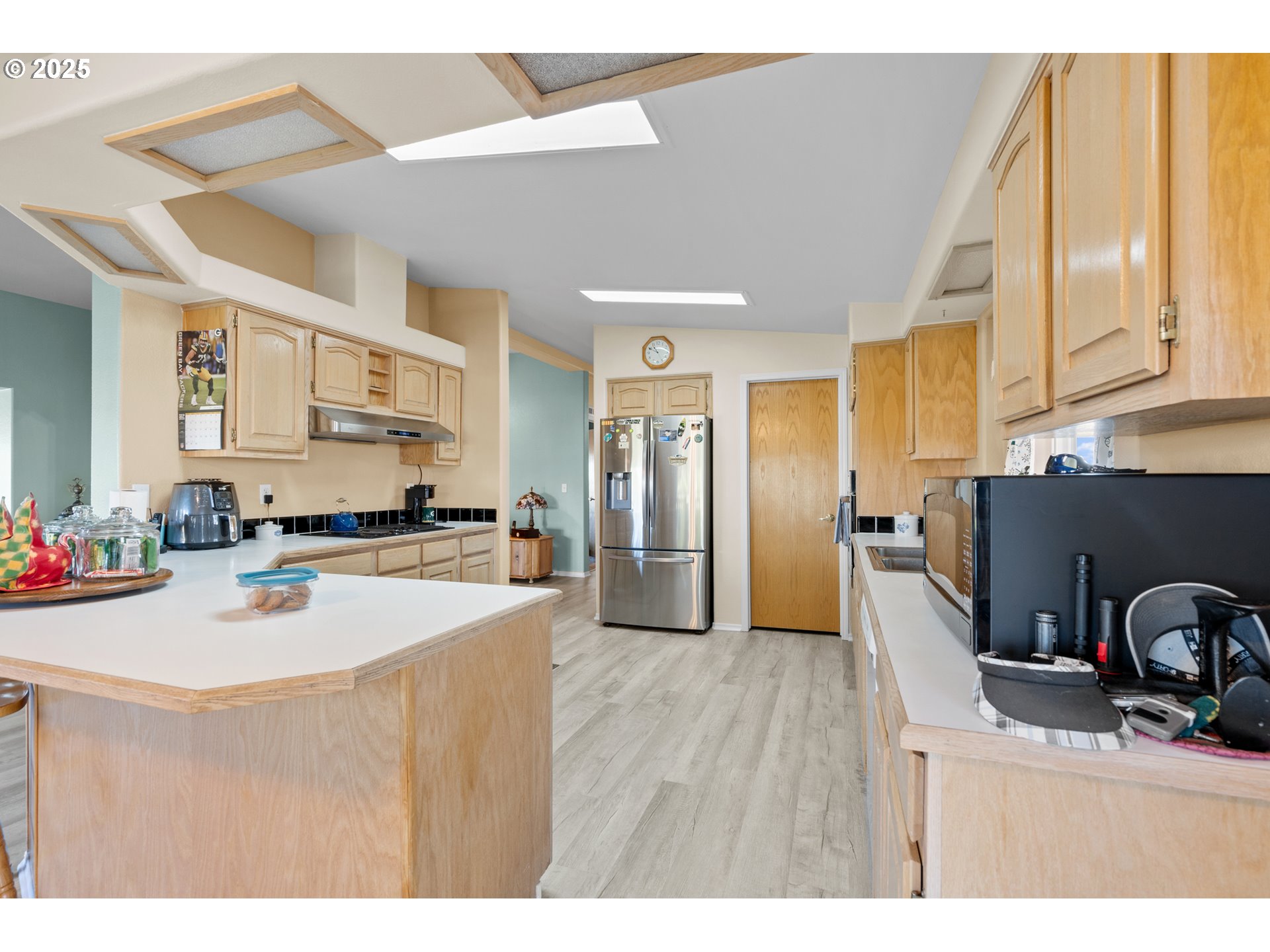 34656 County 1172 Road Stanfield, OR 97875 - Photo 5 of 48 a kitchen with stainless steel appliances granite countertop a sink refrigerator and cabinets