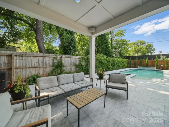a view of a patio with couches and a table