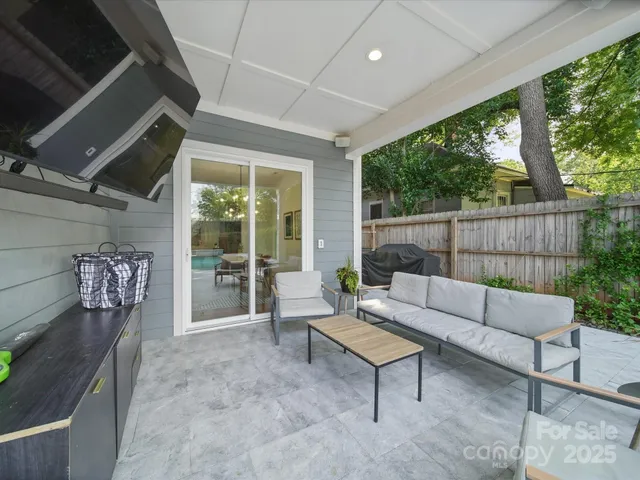 a outdoor living space with furniture and garden view