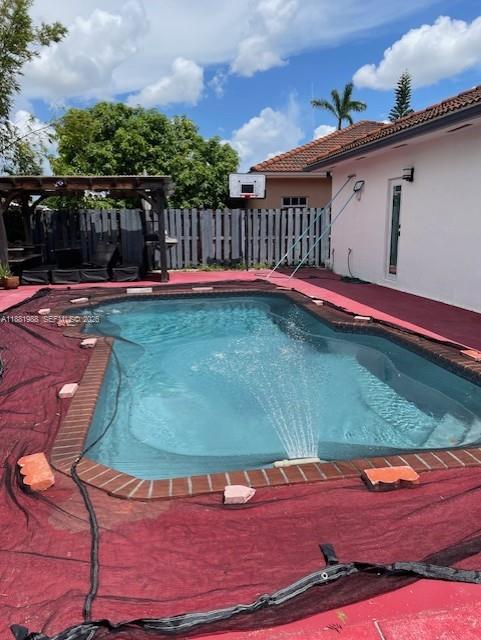 18214 Southwest 144th Place Miami, FL 33177 - Photo 18 of 20 a view of a backyard with a deck