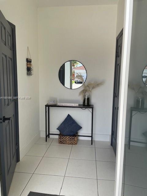 18214 Southwest 144th Place Miami, FL 33177 - Photo 3 of 20 a room with a table and a chair