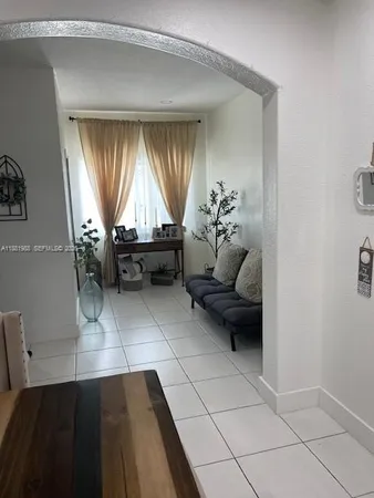 a living room with a couch and a table