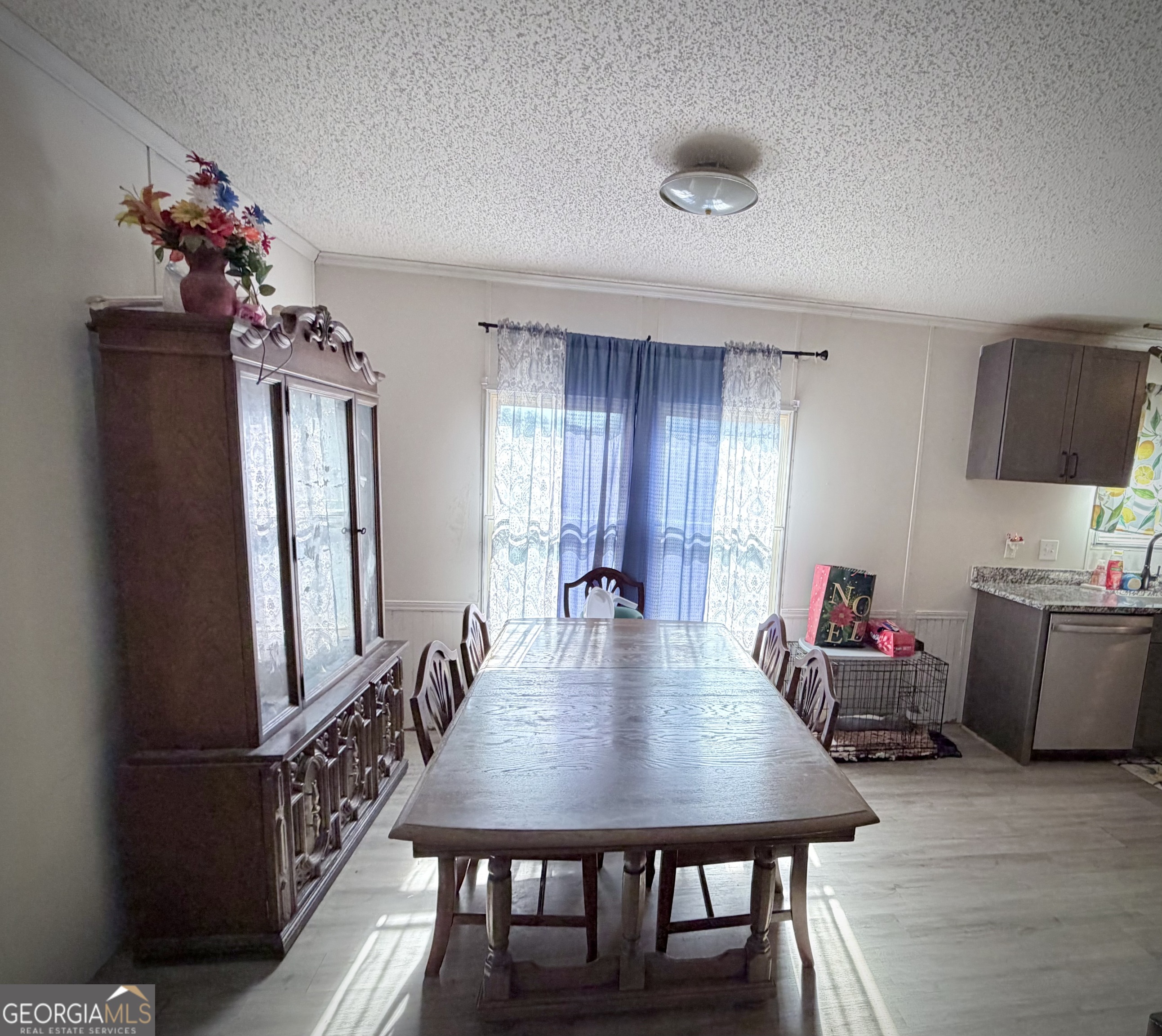 5448 Blanton Mill Road Williamson, GA 30292 - Photo 14 of 50 a view of a dining room with furniture and wooden floor