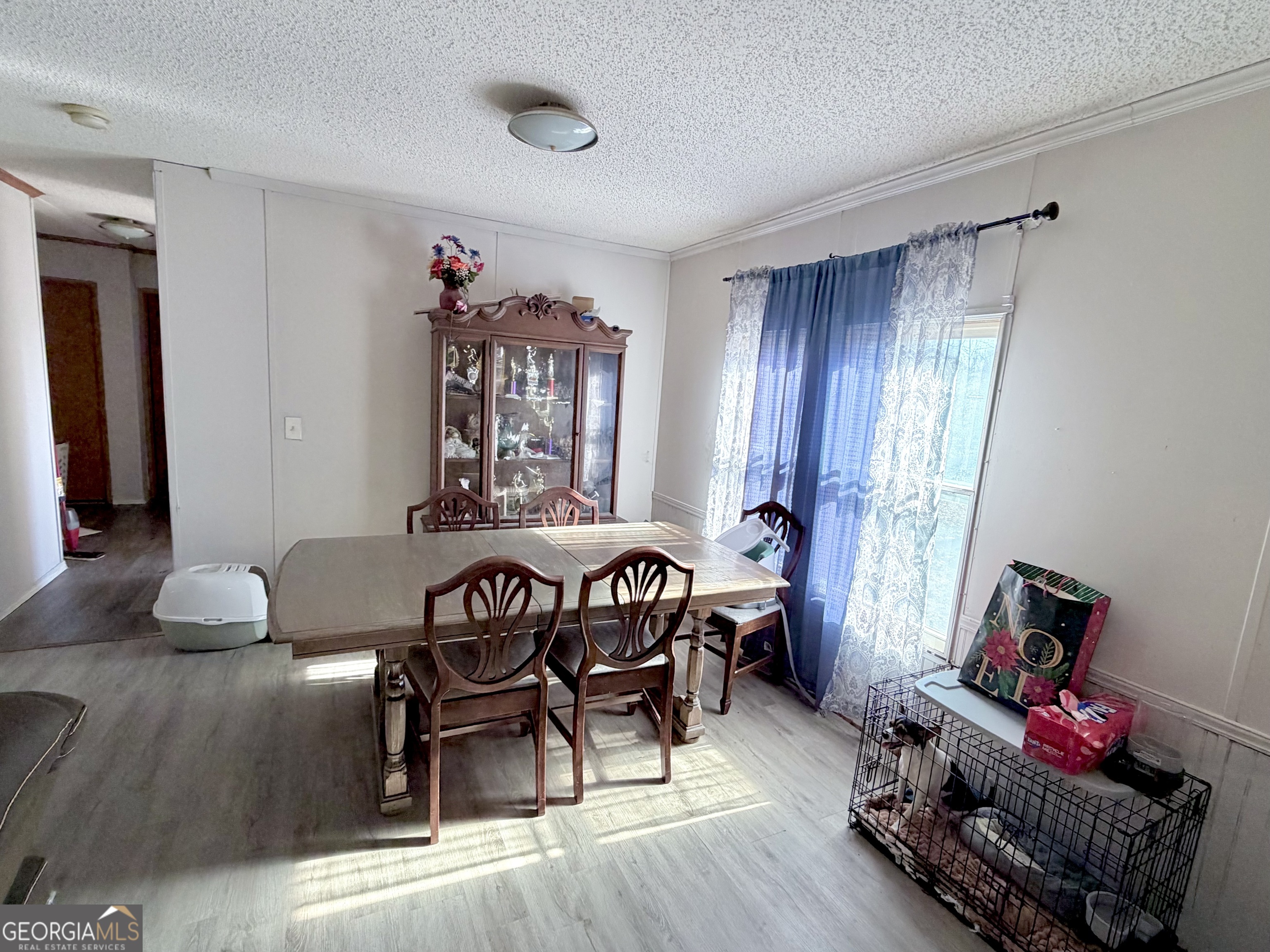 5448 Blanton Mill Road Williamson, GA 30292 - Photo 15 of 50 a view of a livingroom with furniture window and wooden floor