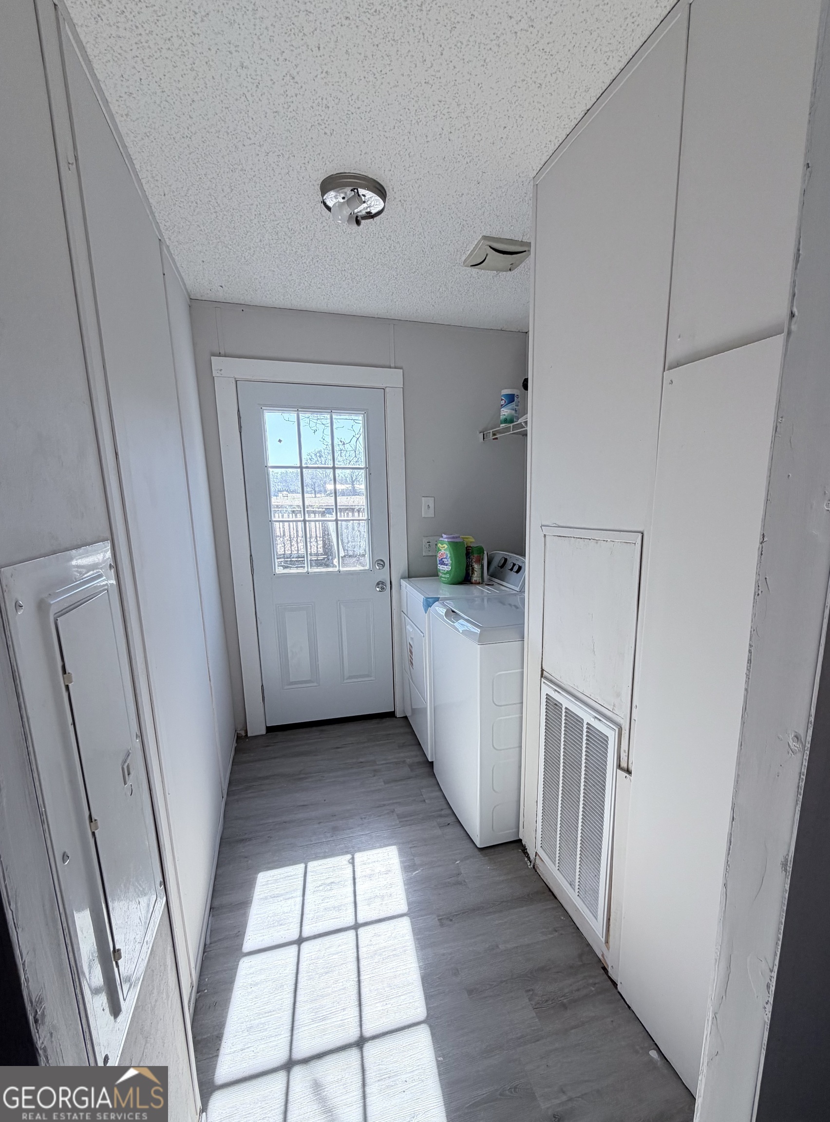 5448 Blanton Mill Road Williamson, GA 30292 - Photo 16 of 50 a view of a hallway with a window