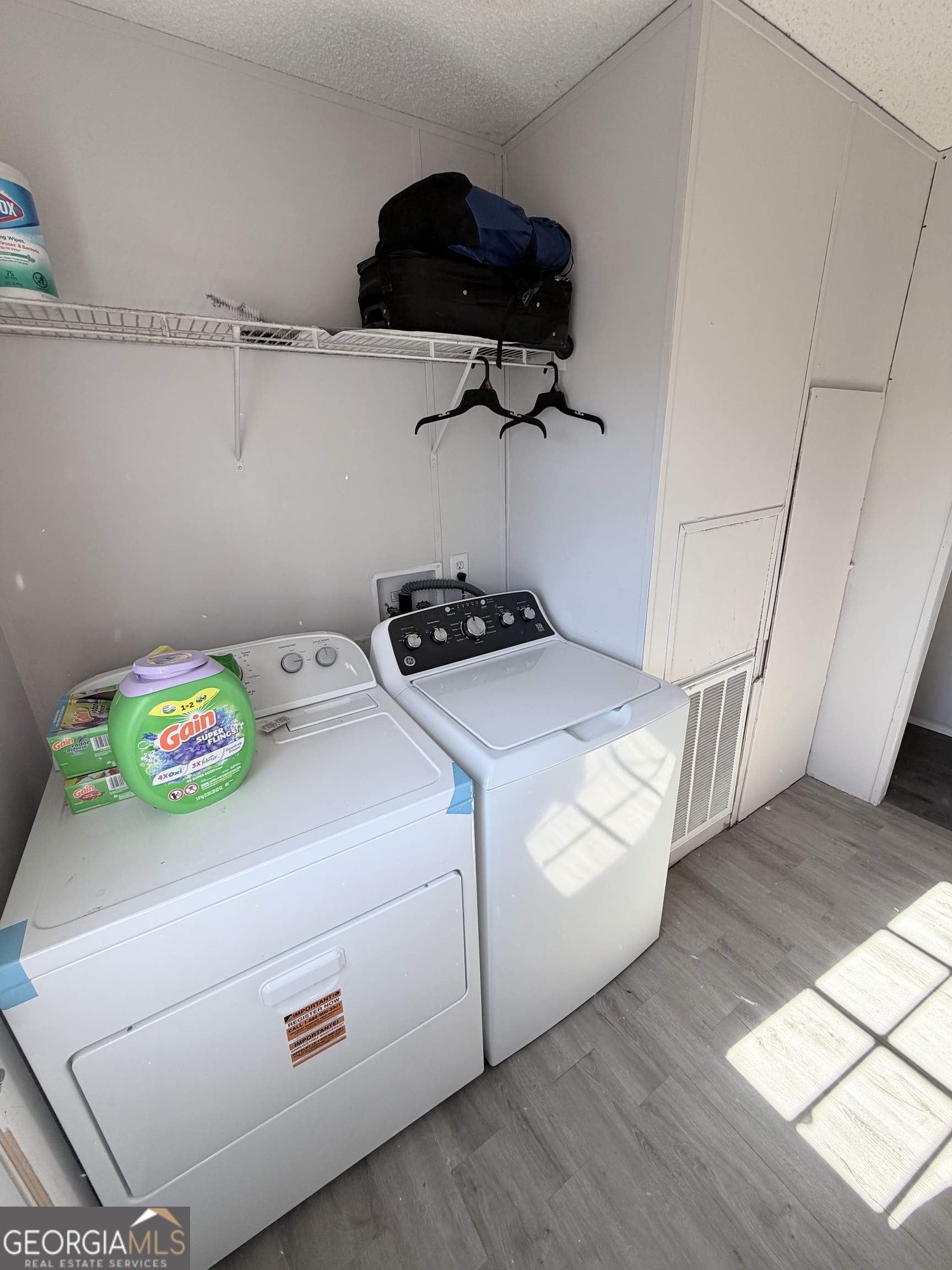 5448 Blanton Mill Road Williamson, GA 30292 - Photo 17 of 50 a utility room with dryer and washer