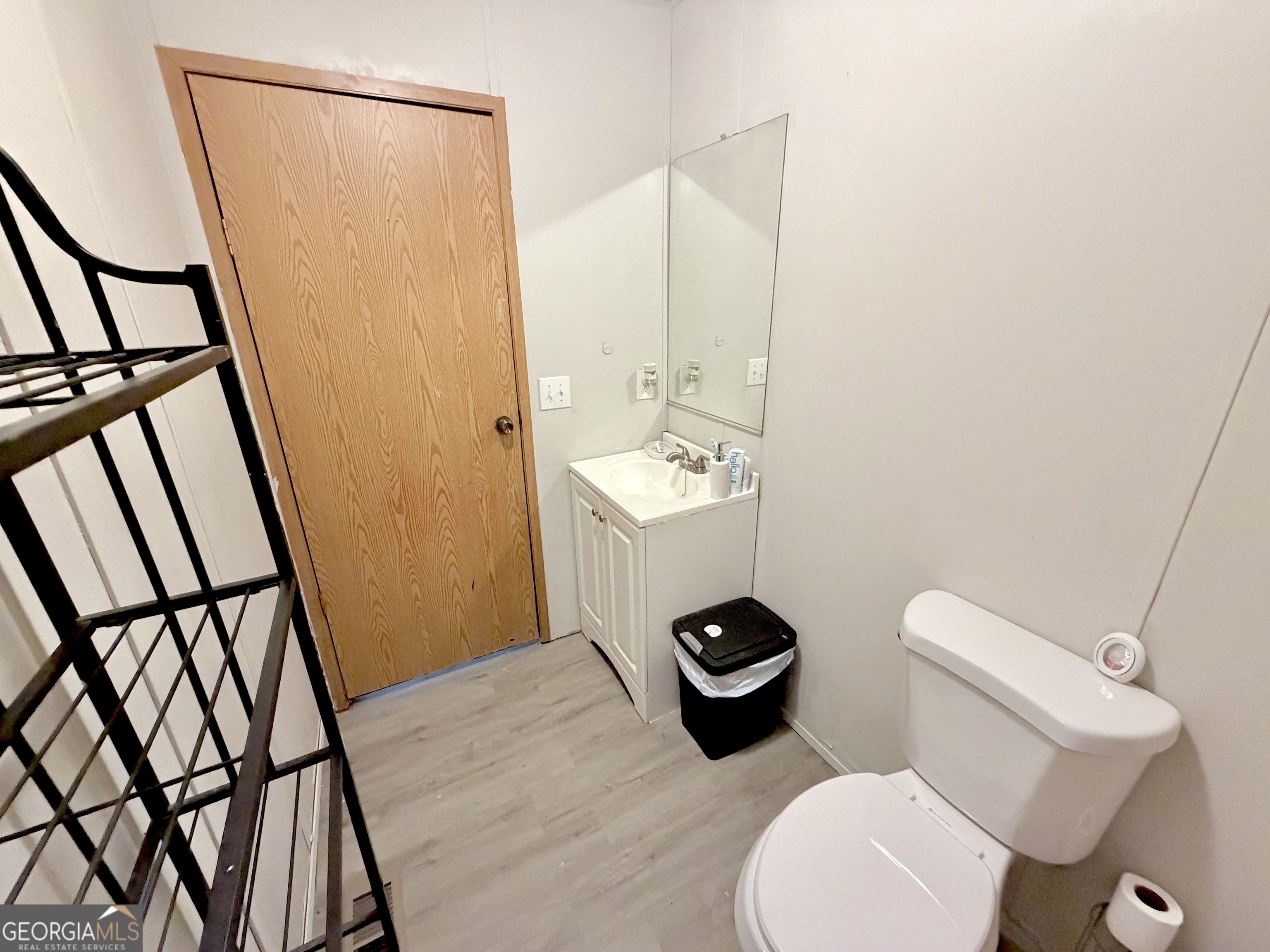 5448 Blanton Mill Road Williamson, GA 30292 - Photo 29 of 50 a bathroom with a toilet and a mirror