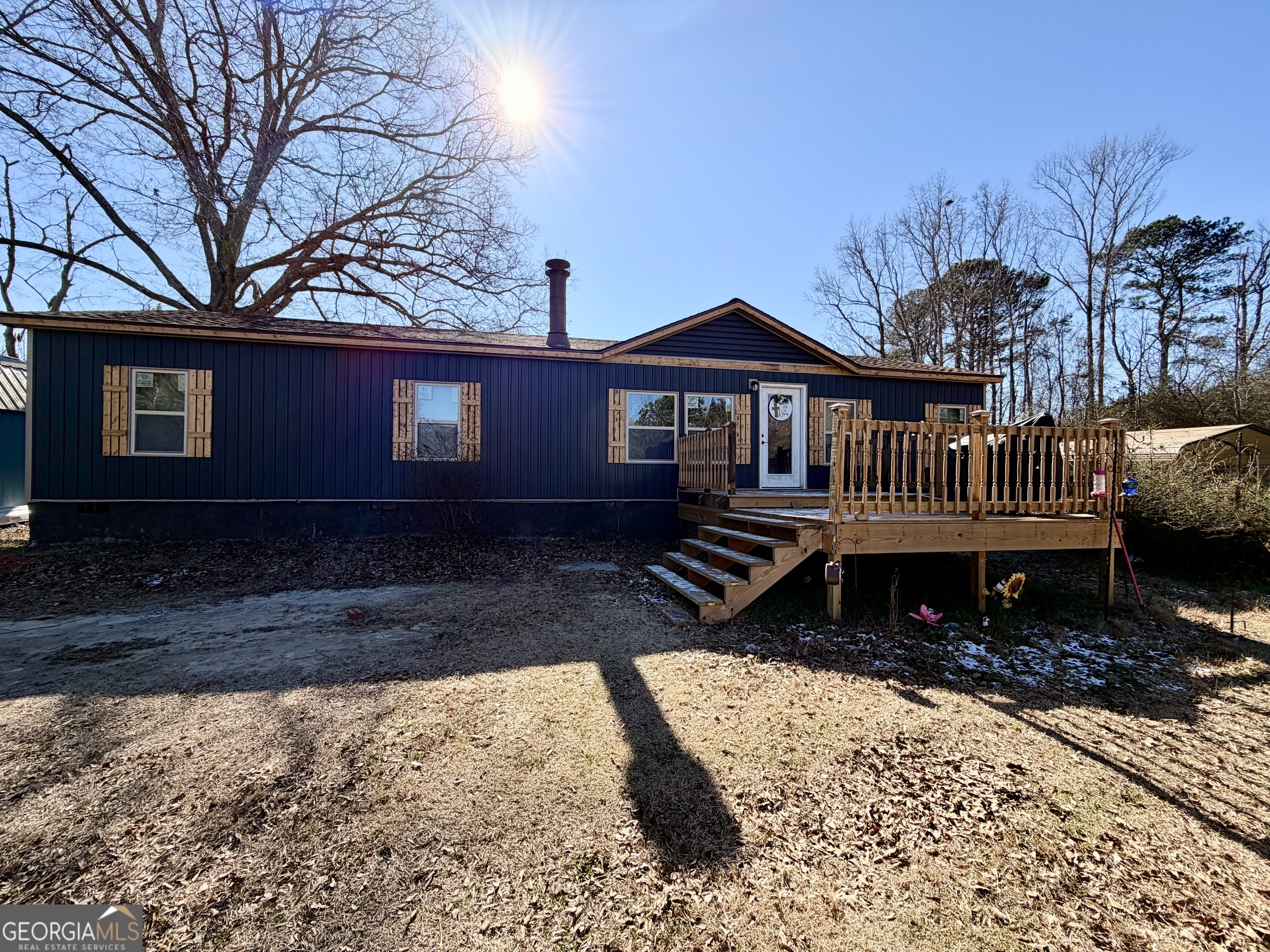 5448 Blanton Mill Road Williamson, GA 30292 - Photo 3 of 50 a view of a house with a yard