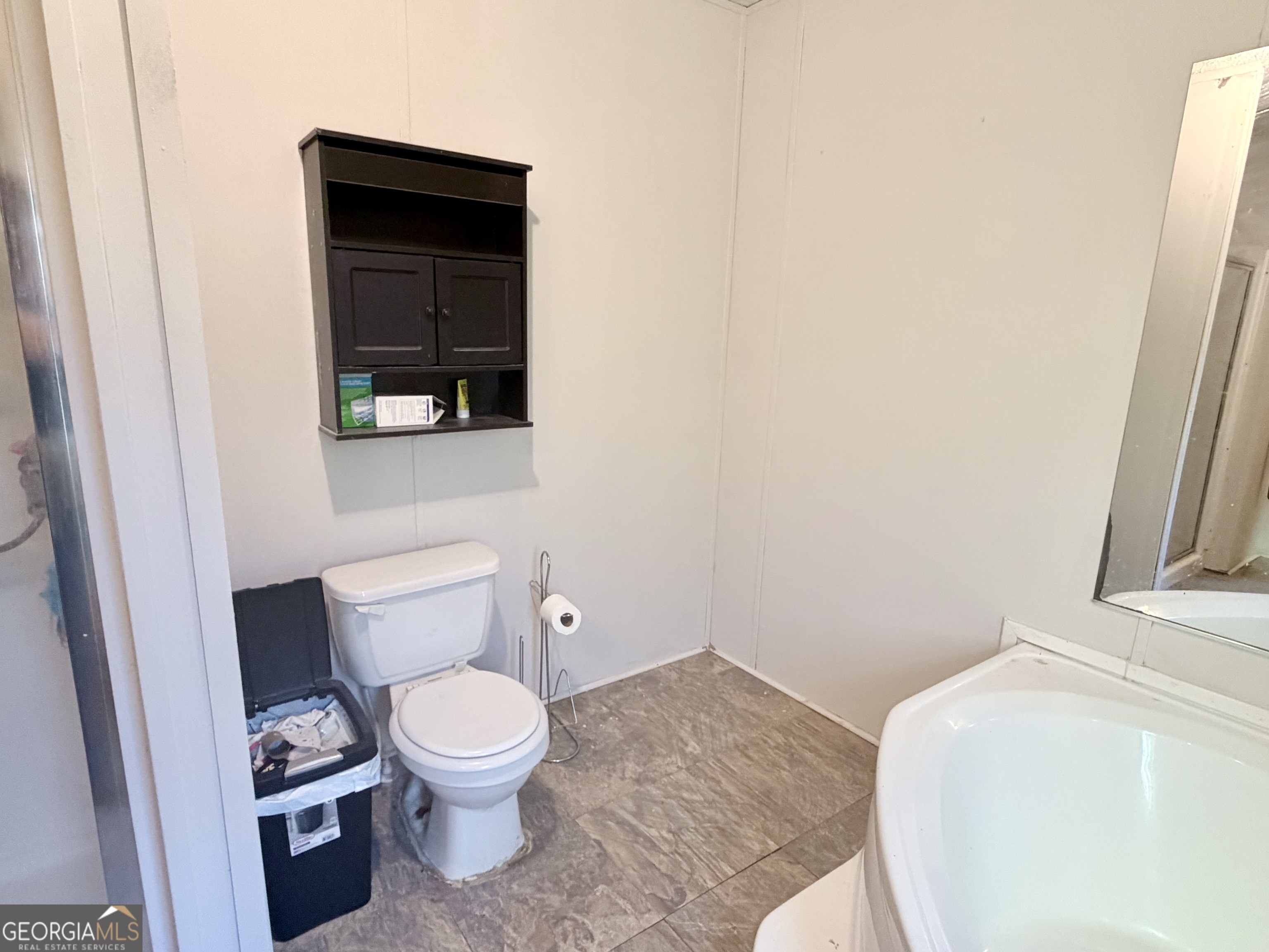 5448 Blanton Mill Road Williamson, GA 30292 - Photo 36 of 50 a bathroom with a toilet and a sink