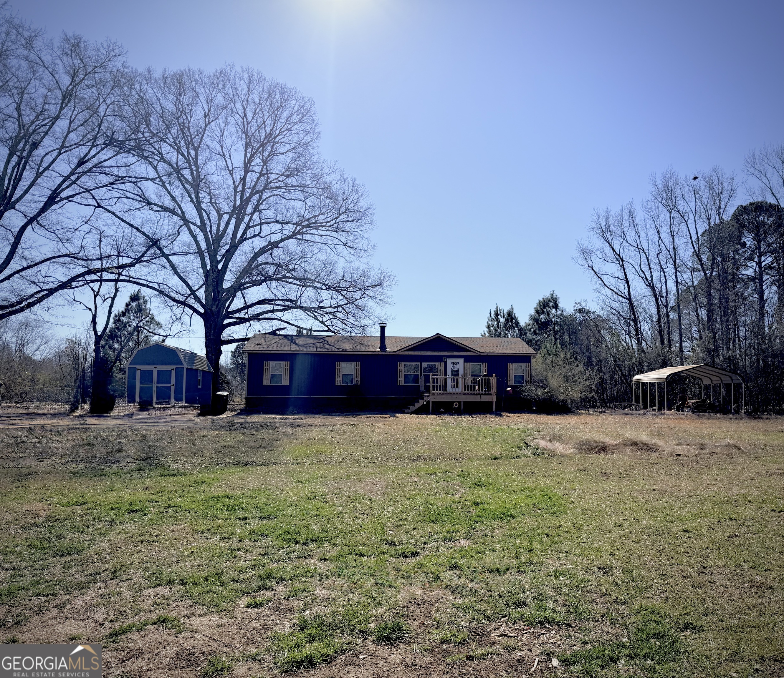 5448 Blanton Mill Road Williamson, GA 30292 - Photo 41 of 50 a house view with a garden space